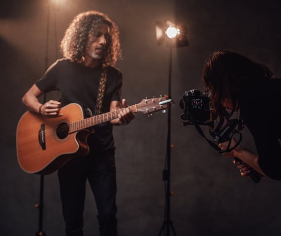 Videographer recording a music video production in israel
