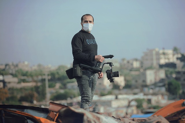 Journalist filming a news video production in Israel.