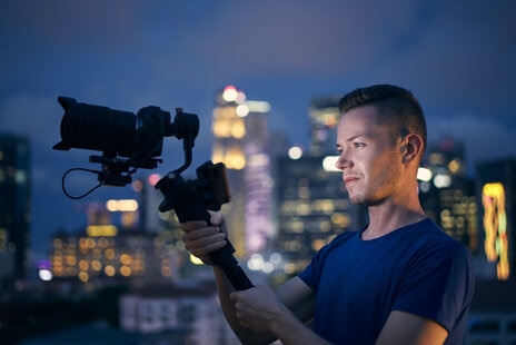 Videographer filming a corporate video production in Tel Aviv, Israel.