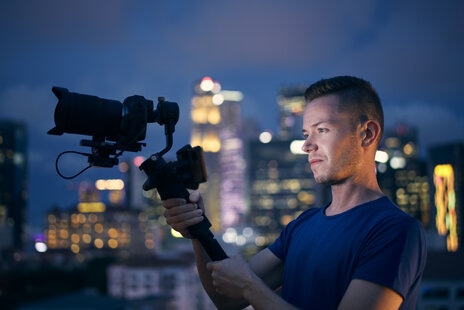 Videographer filming a corporate video production in Tel Aviv, Israel.